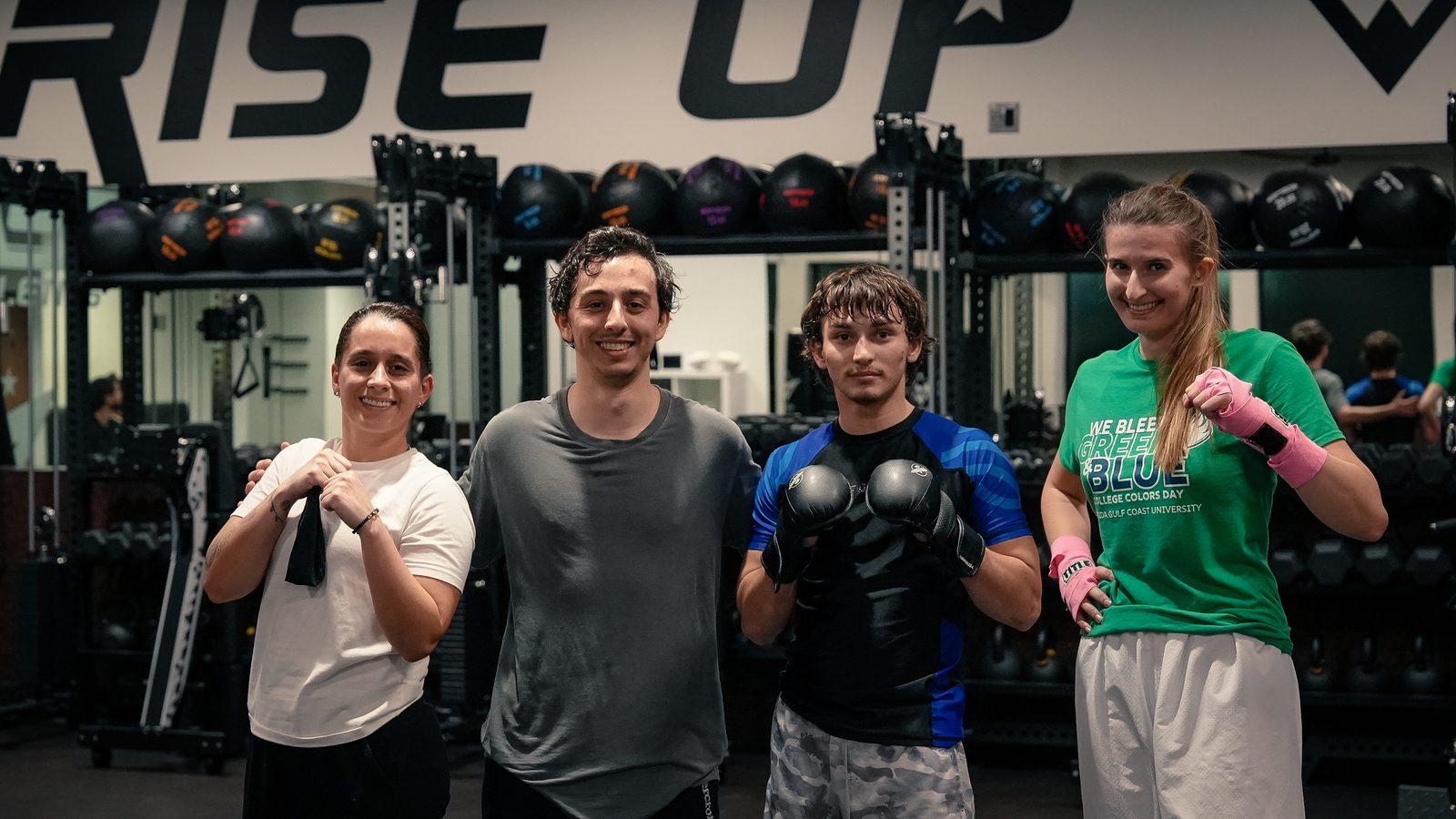 Kickboxing class members together after training