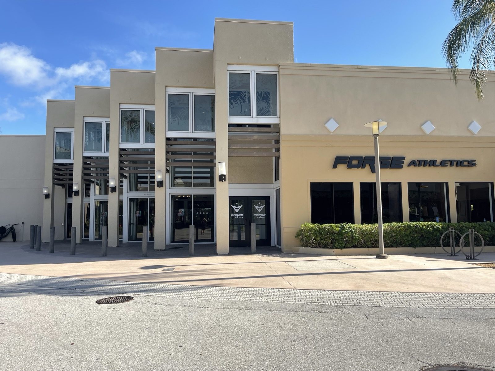 The Forge Athletics storefront with black doors at Coastland Center