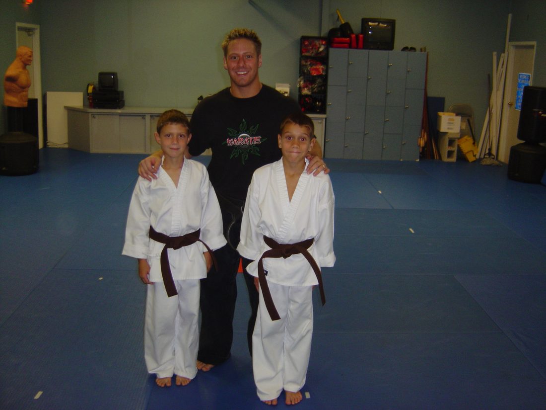 Wil Pino with students during the first year of his own school, Elite Martial Arts in Naples